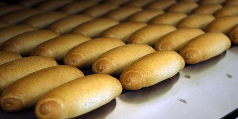 Fresh Bread On The Conveyor Belt Industrial Automation Controller